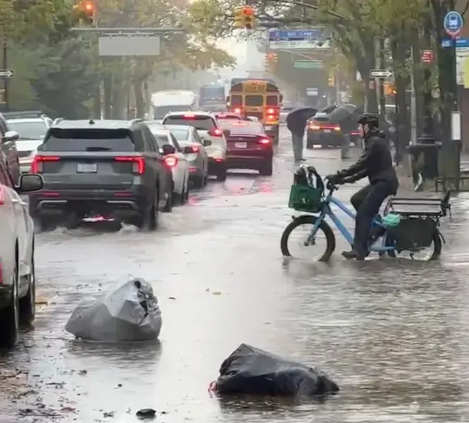 Flooded Queens street during a heavy rainstorm